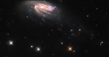 تلسكوب هابل الفضائى يكشف أسرار مجرات قنديل البحر