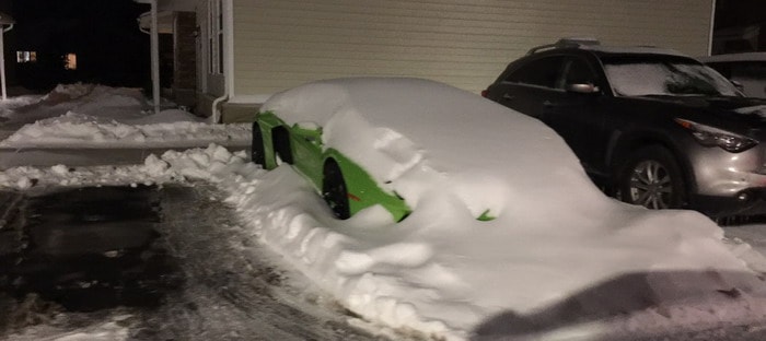 لامبورجيني أفنتادور تحتجز أسفل كومة من الثلوج !!