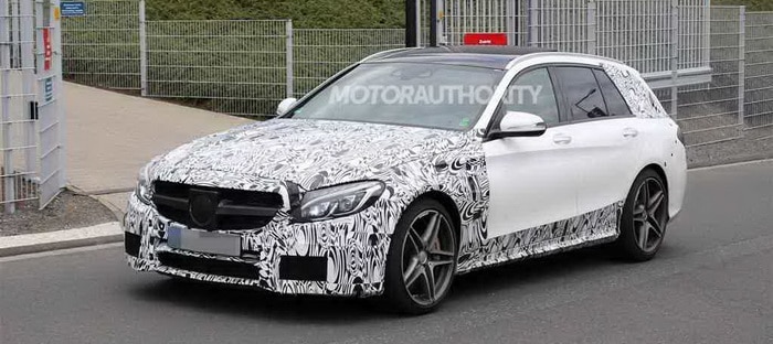 مرسيدس C63 AMG استيشن وسيدان 2015 تطلان من خلف الستار في صور تجسسية
