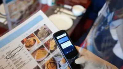 أصحاب المطاعم الصينية يستعينون بمترجم زكى لتلبية طلبات مشجعى الأولمبياد
