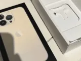 يعني إيه.. وصول سلسلة iPhone 13 في فرنسا بسماعات أذن فى العلبة