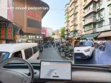 XPENG Demonstrates In-House Autonomous Driving in Chaotic City Traffic